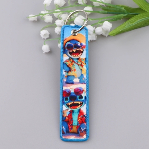 1 COPY - Disney Stitch of Lilo & Stitch Blue Keychain / Motorcycle Jet Tag - Picture 1 of 4